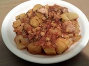 A picture of tomato chicken stew