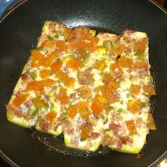 A picture of Baked zucchini bruschetta.