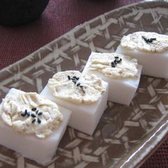 A picture of Hanpen Fish Cakes Topped with Sesame Cream Cheese.