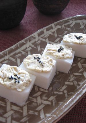 A picture of Hanpen Fish Cakes Topped with Sesame Cream Cheese.