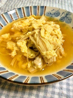 A picture of Egg Soup with Enoki Mushrooms.