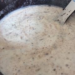 A picture of Cookies And Cream Milk For Cereal.