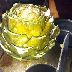 A picture of Herb Buttered Artichokes.