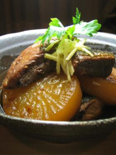 A picture of Simmered Amberjack and Daikon Radish.