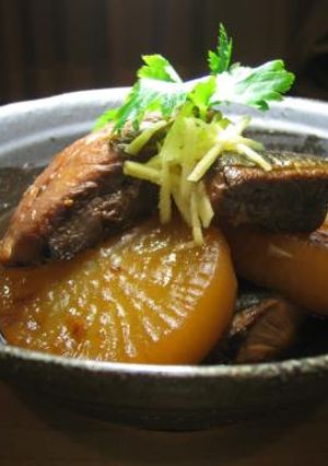 A picture of Simmered Amberjack and Daikon Radish.