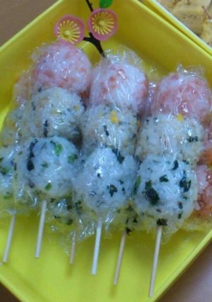 A picture of Tri-Colored Rice Balls on a Stick for Dolls' Festival and Cherry Blossom Viewing.
