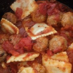A picture of Ravioli and meatballs!.