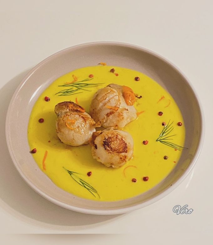 Une photo de Noix de St Jacques poêlées à la crème d’orange
