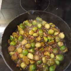 A picture of Cast Iron Brussel Sprouts w/ Bacon.