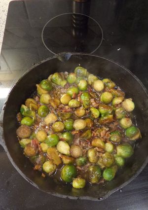 A picture of Cast Iron Brussel Sprouts w/ Bacon.