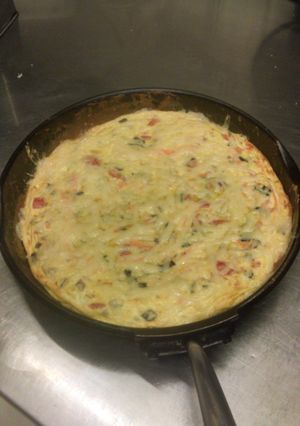 A picture of Cheesy baked eggs.