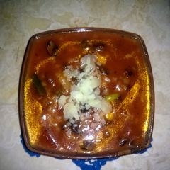 A picture of Stelline tomato mushroom bean stew (minestrone?).
