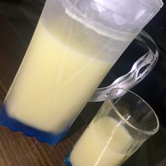 A picture of Homemade exotic drink 🍹 🥥🍍.