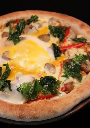 A picture of Pad Gra Prao Pizza.