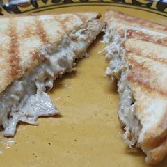 A picture of Chicken and cheese grilled sandwich.