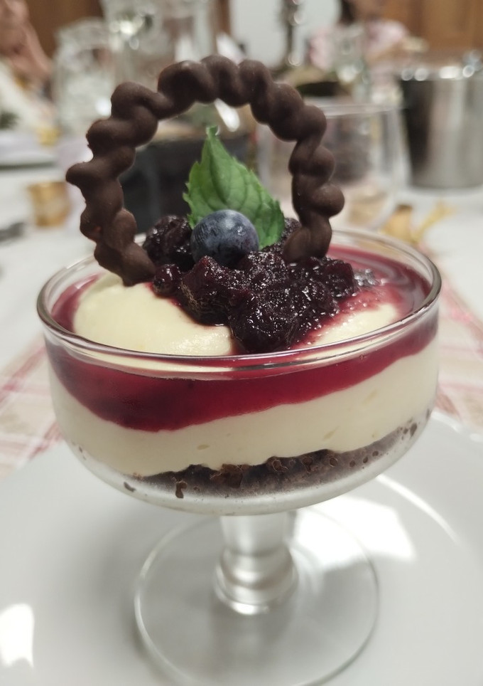 Una foto de Mousse de champagne con frutos rojos