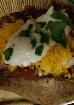 A picture of Stuffed potato with chilli.