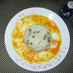Pea Rice With Soft Boiled Eggs A picture of Pea Rice With Soft Boiled Eggs.