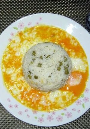 A picture of Pea Rice With Soft Boiled Eggs.