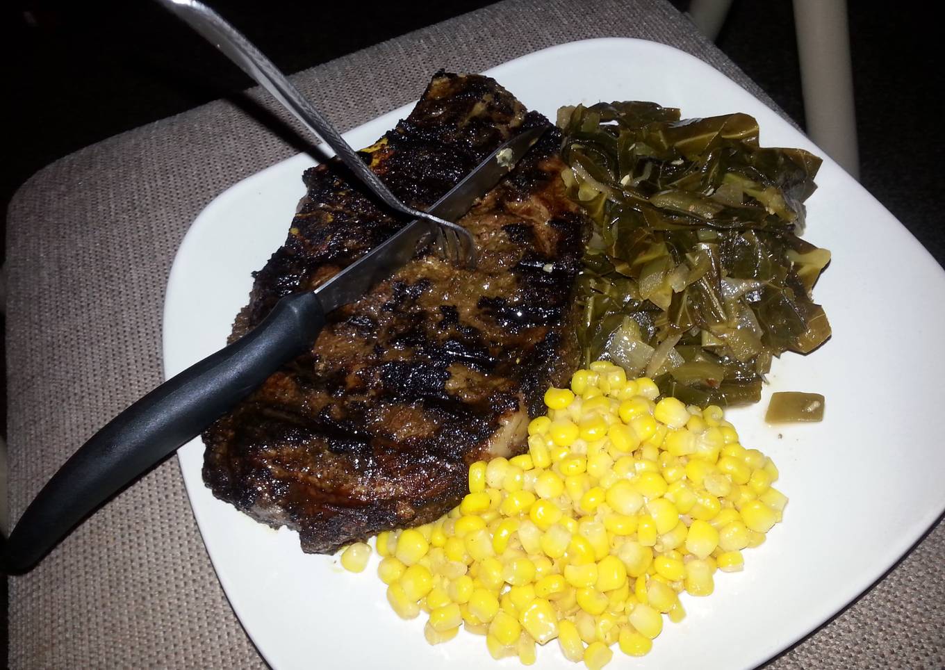 Lebanese spiced rib eye with collards and sweet&spicy corn