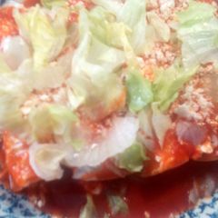 A picture of Chicken enchiladas.