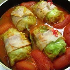 A picture of Packed with Whole Tomatoes! Hot and Comforting Cabbage Rolls.