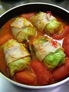 A picture of Packed with Whole Tomatoes! Hot and Comforting Cabbage Rolls.