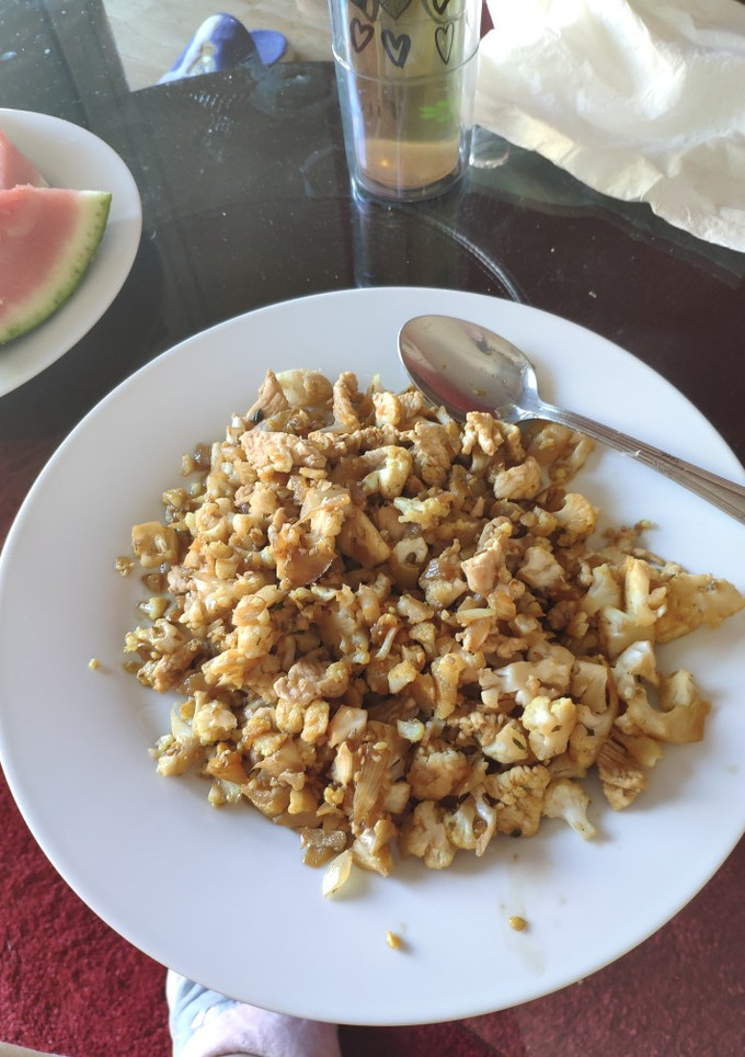 Una foto de Wok de coliflor