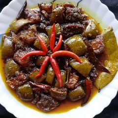 Oily Mango Pickle (আম তেল) A picture of Oily Mango Pickle (আম তেল).