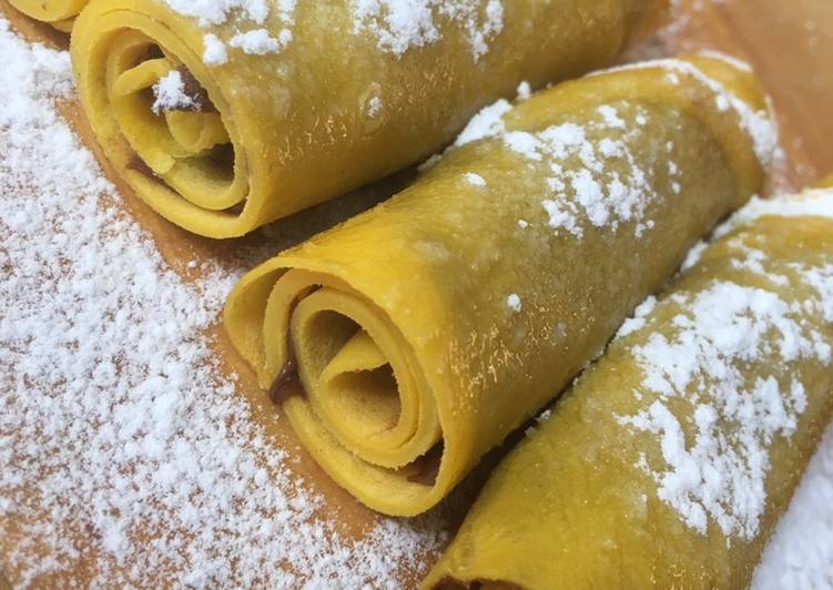 Step-by-Step Guide to Make Fatto in casa super veloce Rotolini di crêpes alla Nutella