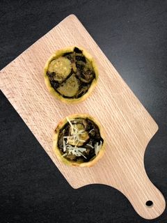 Une photo de Tartelette courgette&pesto