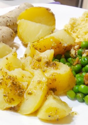 Una foto de Cuscús con patata y guisantes