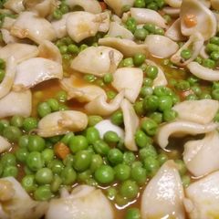 A picture of Squid and pea stew.
