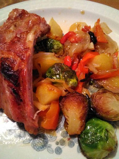 Una foto de Costillar con guarnición