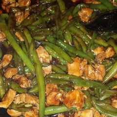 A picture of Chicken and green bean stir fry.