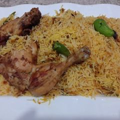 A picture of Masala rice with steam chicken roast #EidkPakwan.