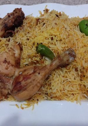 A picture of Masala rice with steam chicken roast #EidkPakwan.