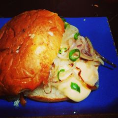 A picture of cheesy classic egg burger.
