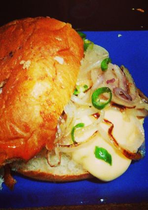 A picture of cheesy classic egg burger.