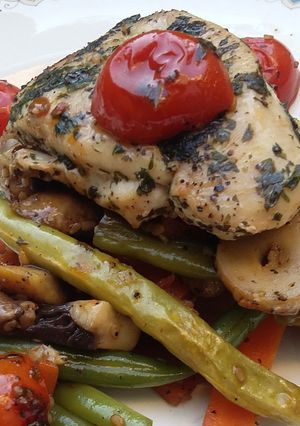 A picture of Herb Crusted Chicken over Vegetable Stir Fry.