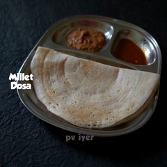 A picture of Millet Dosa with Onion Chutney.