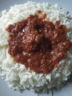 A picture of Rice and chicken stew.