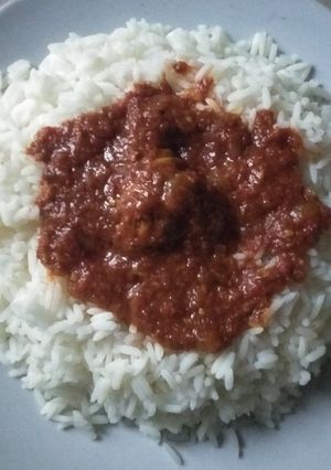A picture of Rice and chicken stew.