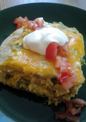 A picture of Green chili chicken enchilladas.