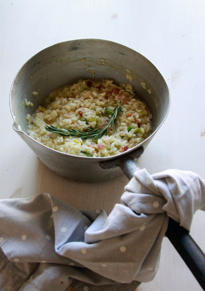 Una foto de Risotto de espárragos y panceta curada