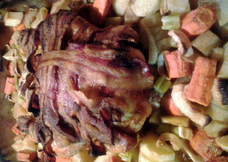 Step-by-Step Guide to Prepare Speedy bacon wrapped whole chicken and roasted vegetables