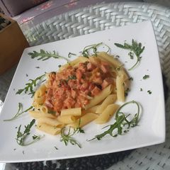 A picture of Penne with Smoked Ham and Mushroom in FreshTomato Cream Sauce.