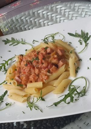 A picture of Penne with Smoked Ham and Mushroom in FreshTomato Cream Sauce.