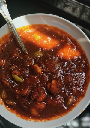 A picture of Sambal udang petai (spicy chili gravy with prawn and stink bean).