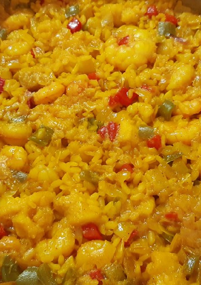 Una foto de Arroz con bacalao y gambas